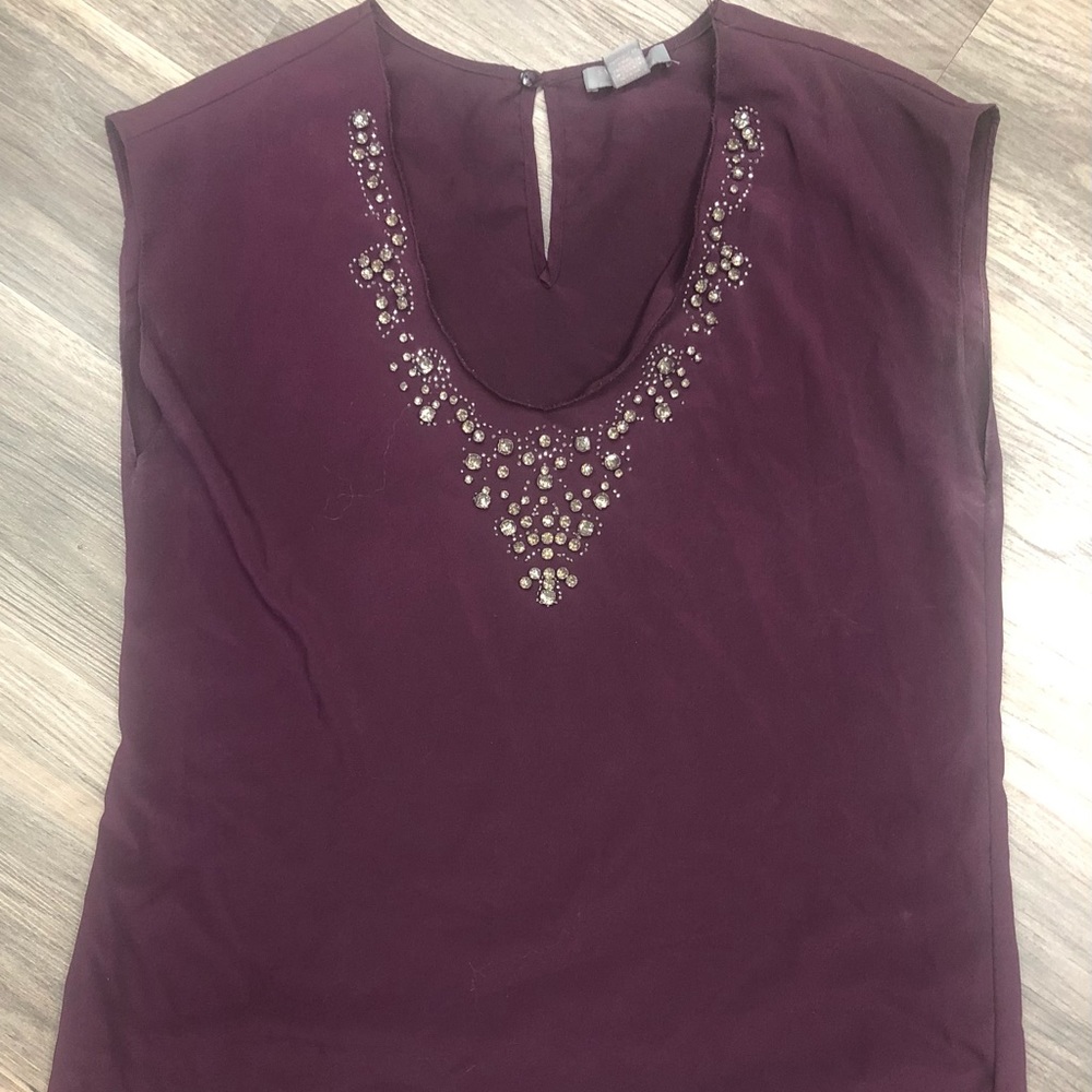 Cute plum and rhinestone top.